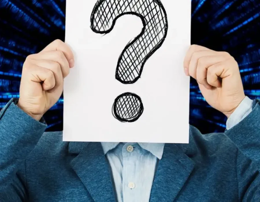 a-man-holding-question-mark-card-board-in-hands-shows-background-checks